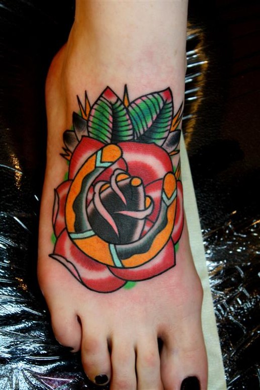 Traditional Horseshoe and Rose Tattoo on foot by Myke Chambers TattooNOW